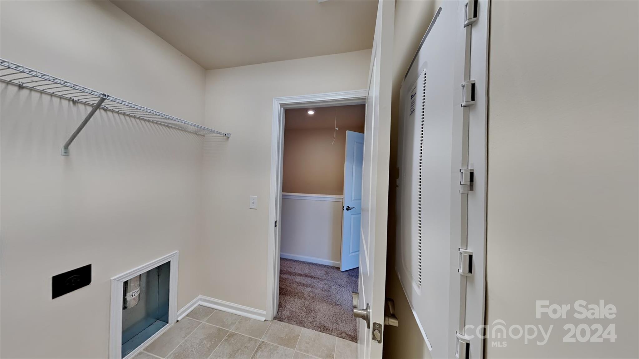 814 Canoe Song Road Fort Mill, SC 29708 - Photo 13 of 20 a view of a bathroom from a corridor