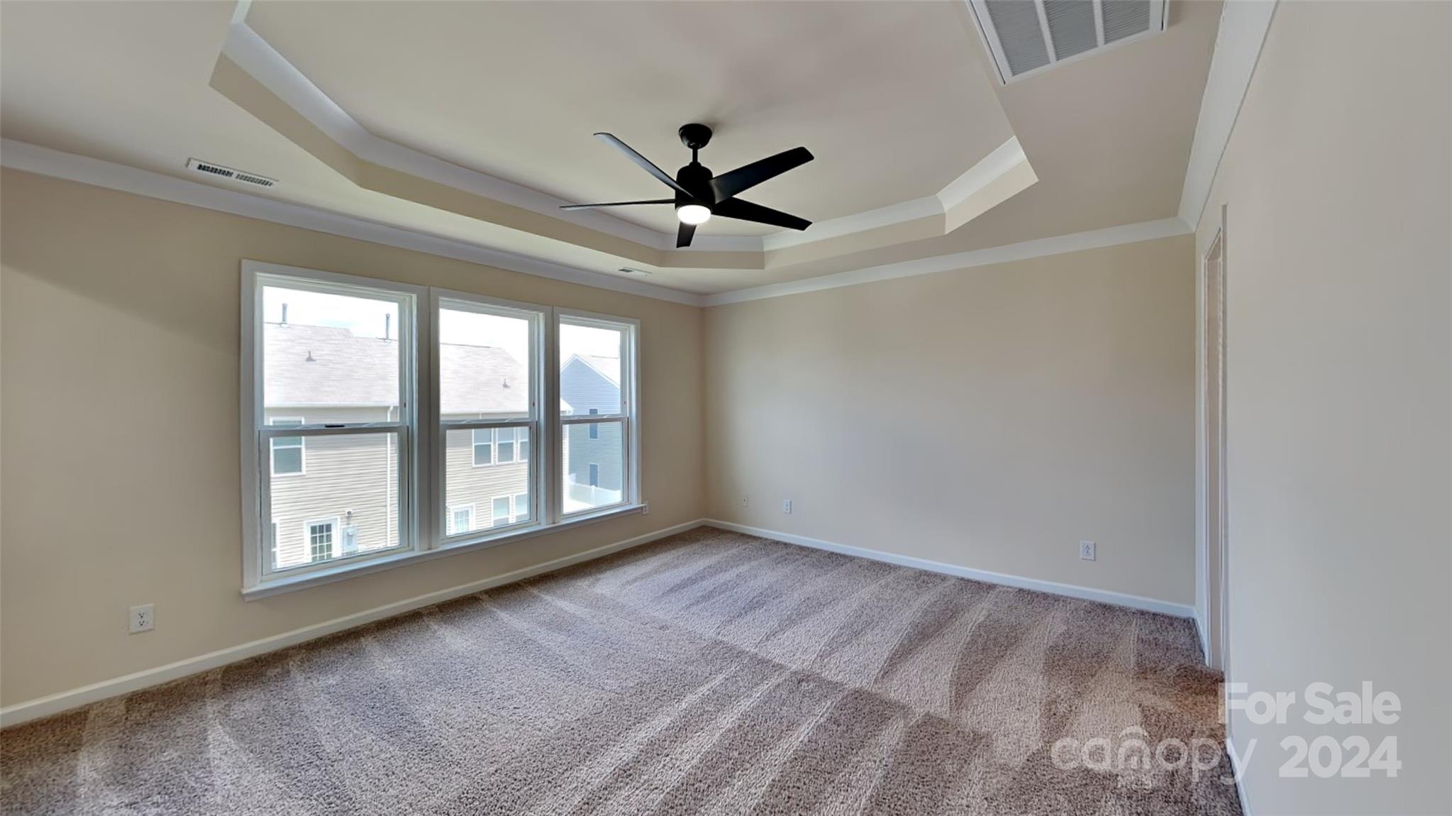 814 Canoe Song Road Fort Mill, SC 29708 - Photo 7 of 20 a view of an empty room with a window