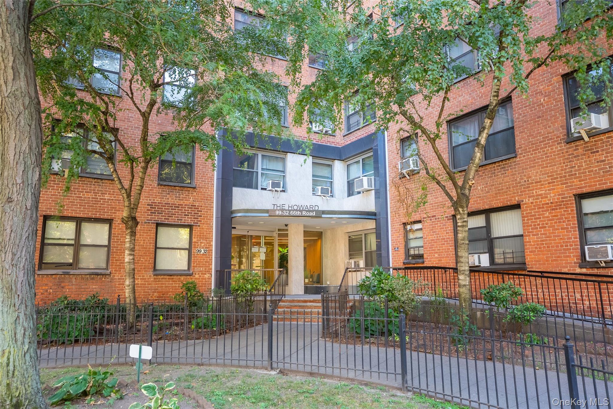 99-32 66th Road, Unit 9N Queens, NY 11374 - Photo 2 of 16 front view of a house