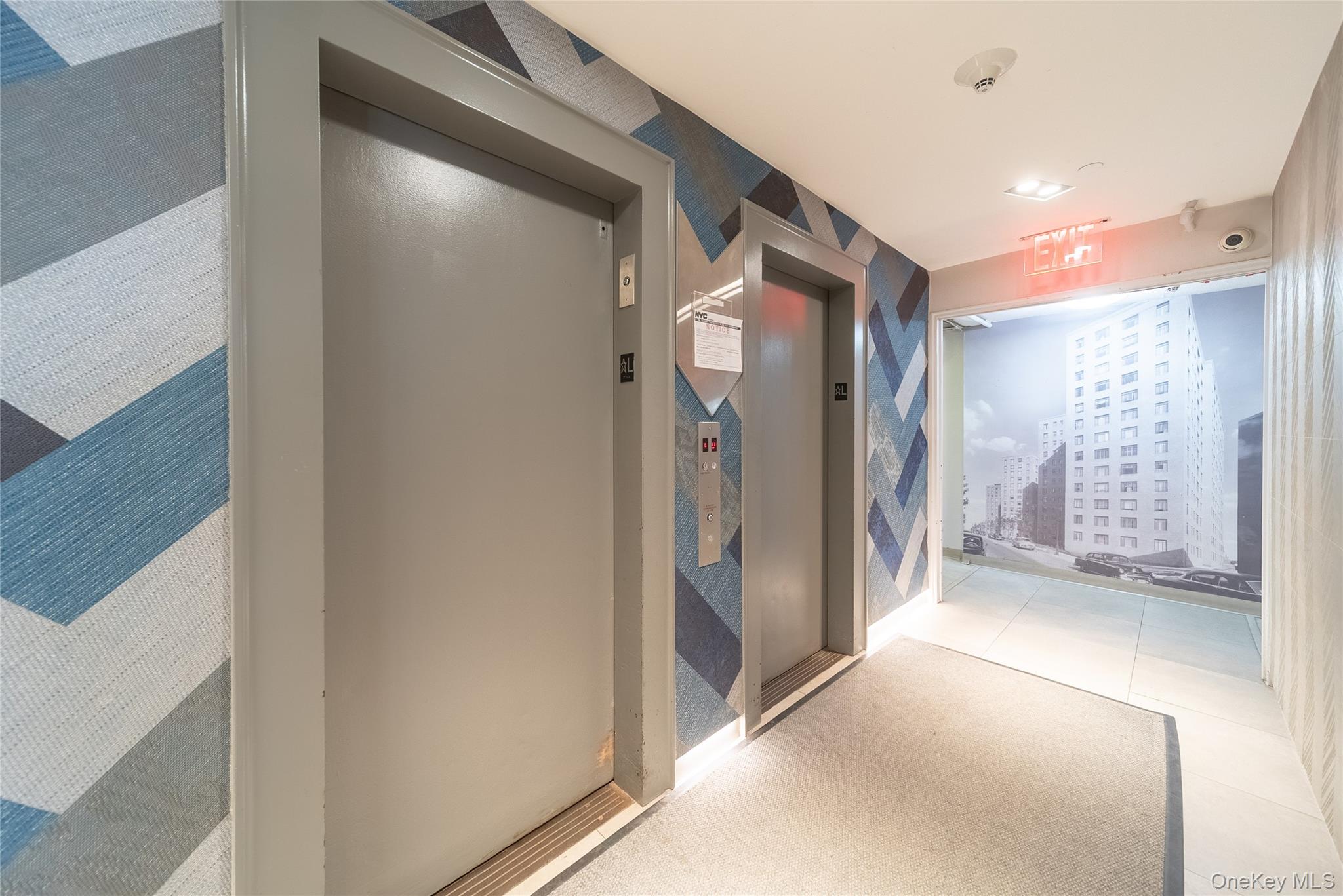 99-32 66th Road, Unit 9N Queens, NY 11374 - Photo 5 of 16 a view of a hallway