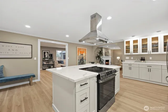 a kitchen with a stove and a sink