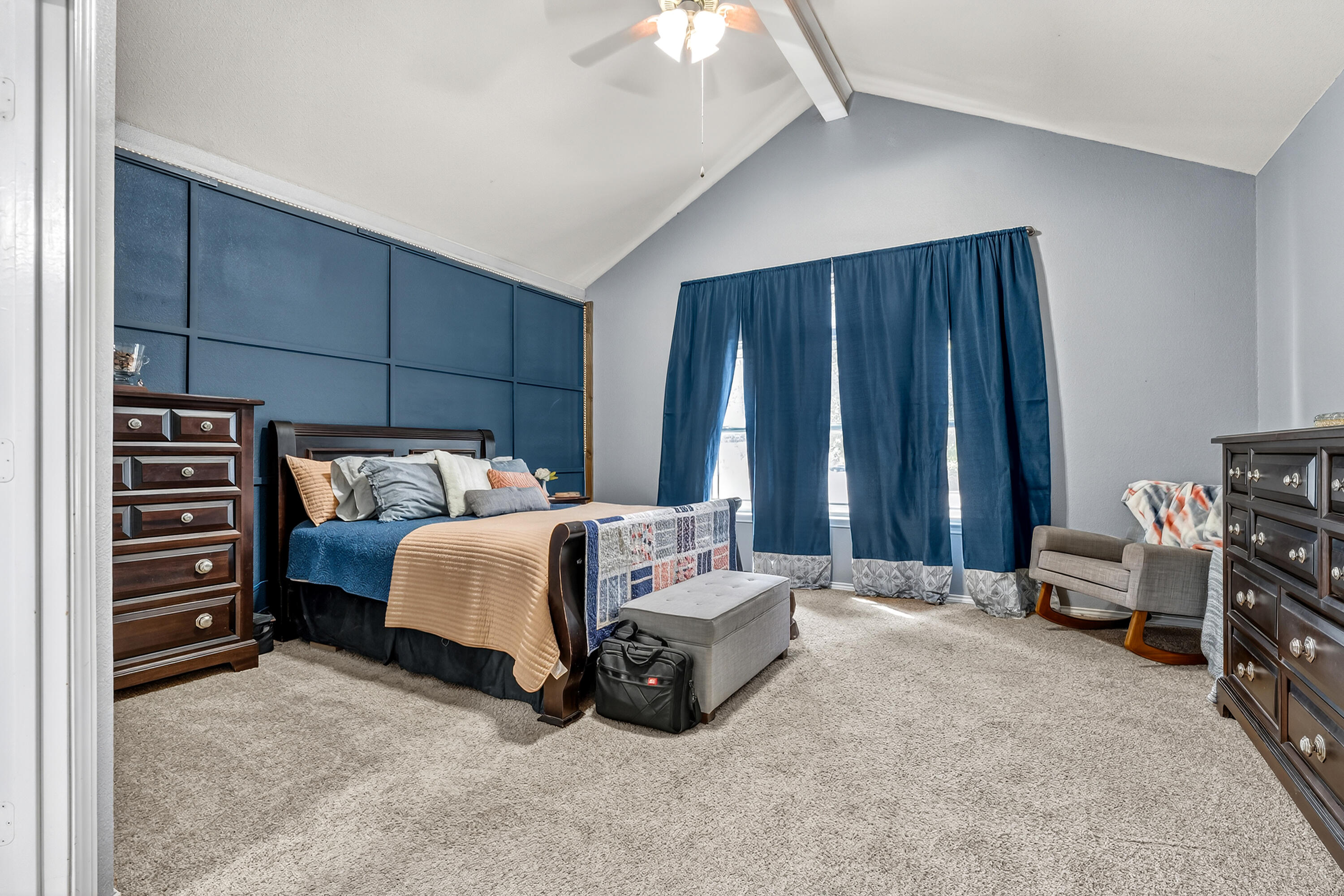 2602 112th Street Lubbock, TX 79423 - Photo 5 of 19 a bedroom with a bed and a cabinets