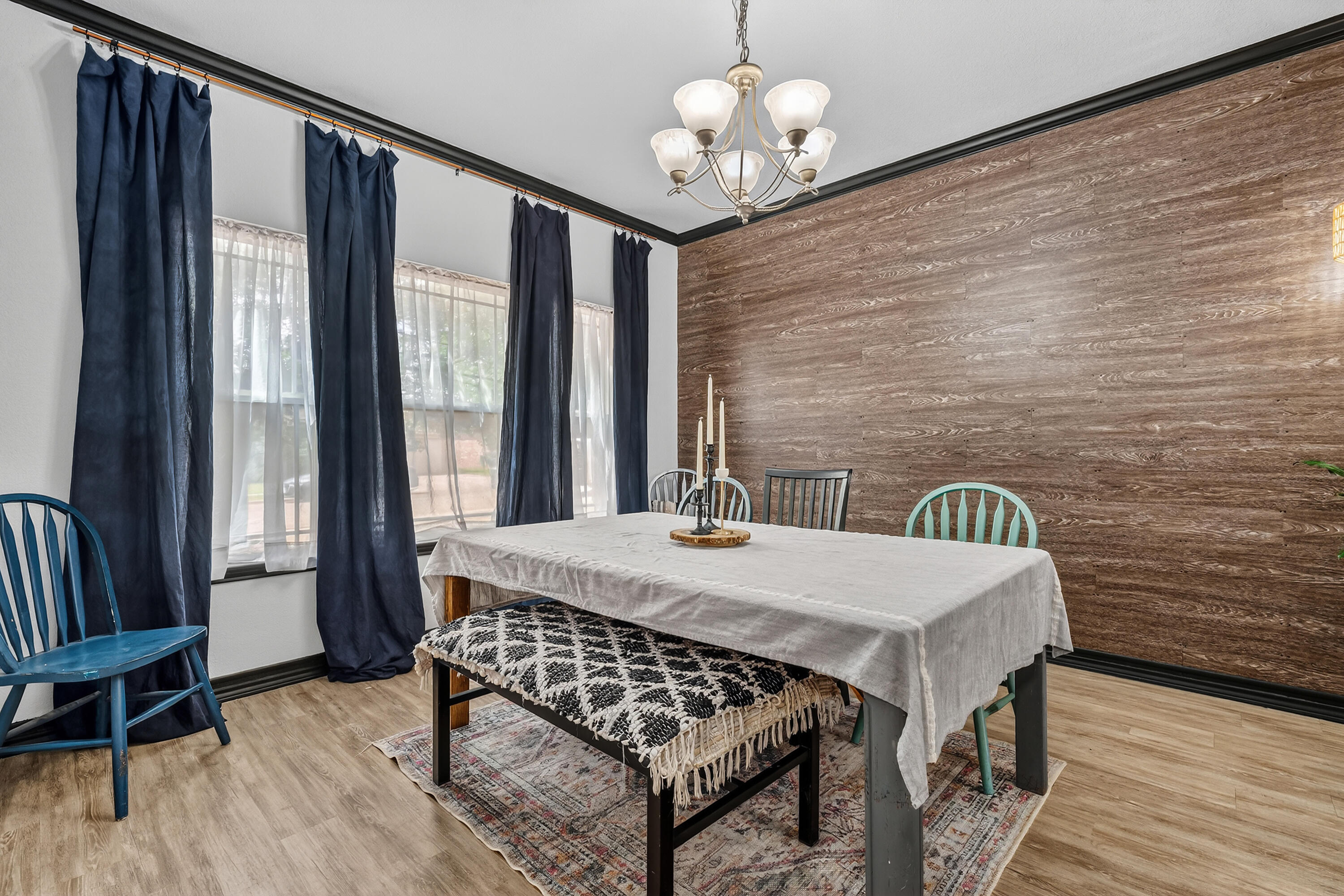 2602 112th Street Lubbock, TX 79423 - Photo 7 of 19 a view of a dining room with furniture window and wooden floor