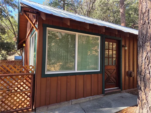 a view of a house with a large window