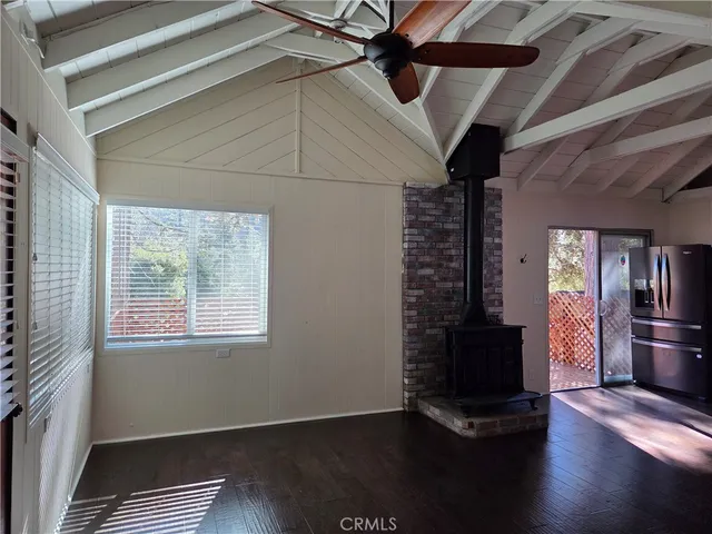 a kitchen with stainless steel appliances granite countertop a stove and a refrigerator