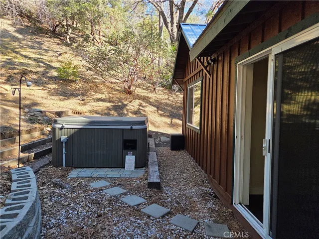 a view of a door and a window