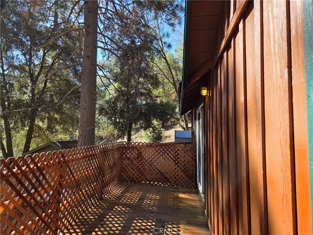 a view of a pathway of a house with a yard