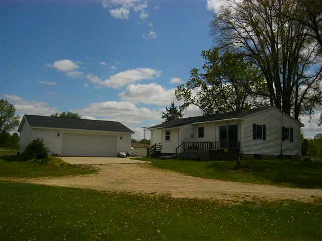 14363 Ideal Road Thomson, IL 61285 - Photo 12 of 12 a view of a house with a garden