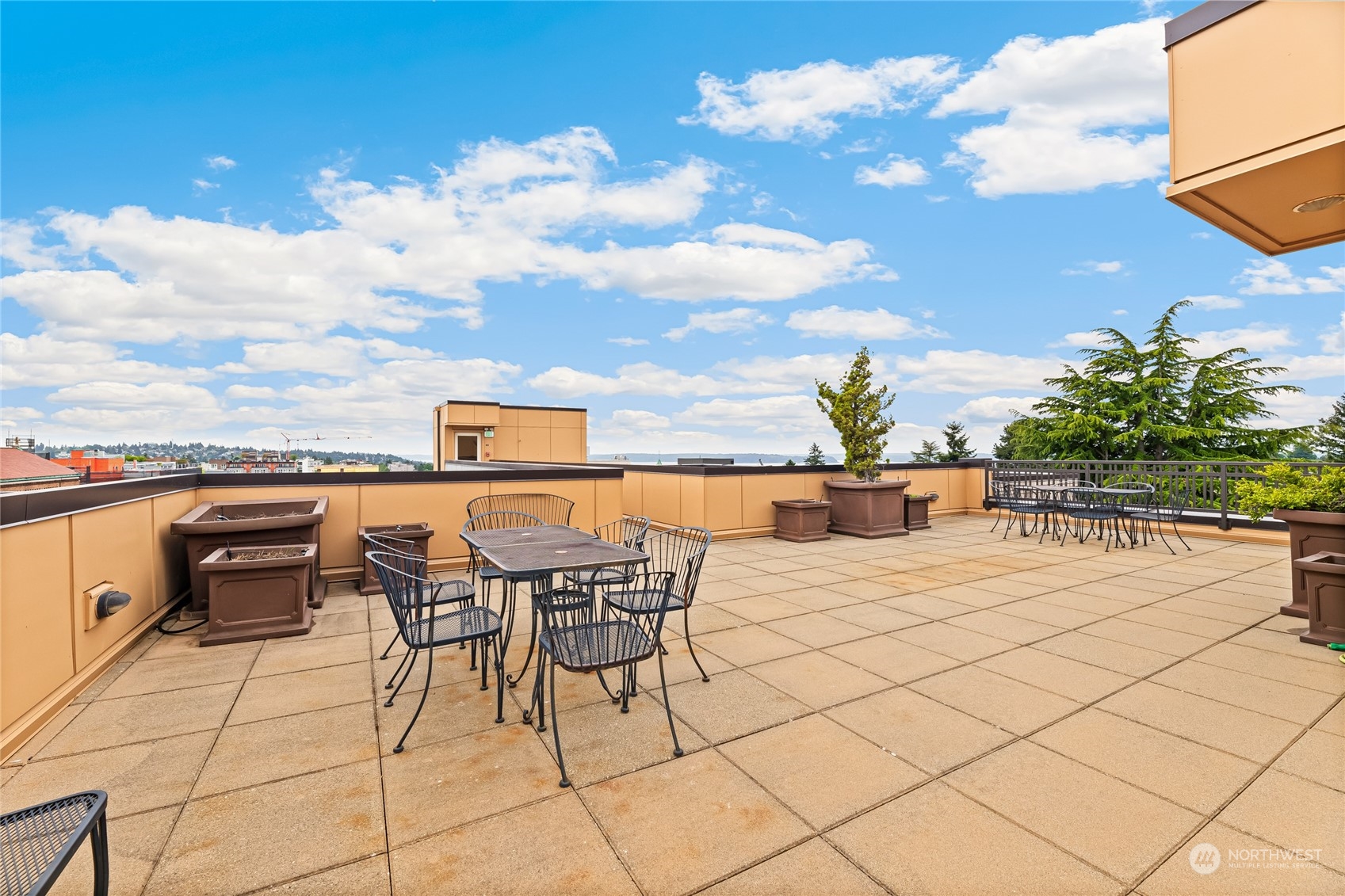 4116 California Avenue Southwest, Unit 313 Seattle, WA 98116 - Photo 17 of 18 a view of a terrace with furniture and stove