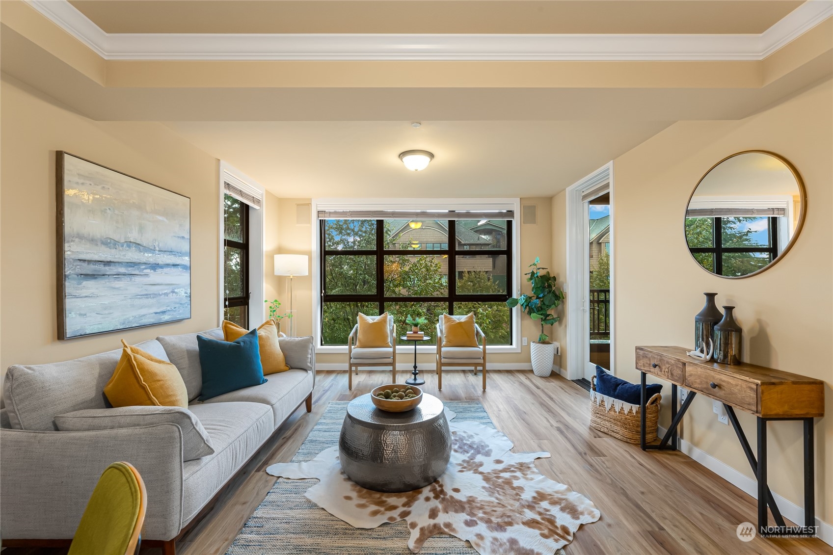 4116 California Avenue Southwest, Unit 313 Seattle, WA 98116 - Photo 2 of 18 a living room with furniture and a large window