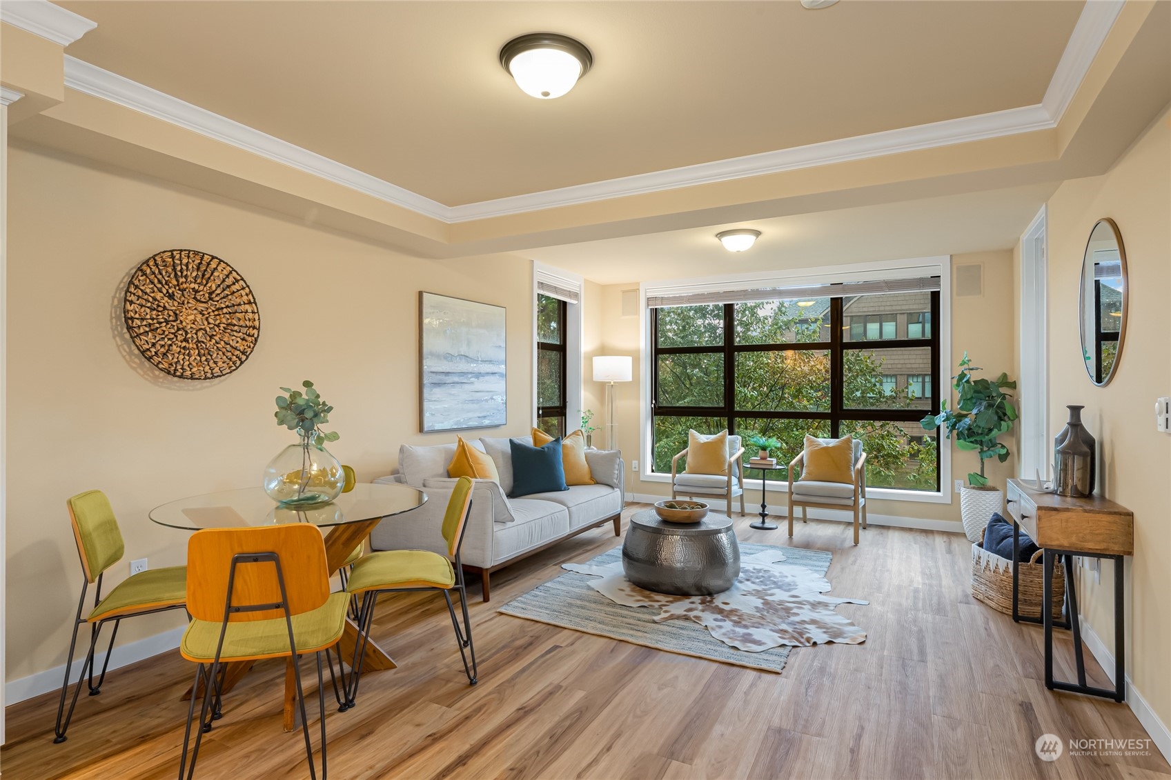 4116 California Avenue Southwest, Unit 313 Seattle, WA 98116 - Photo 6 of 18 a living room with furniture and a large window