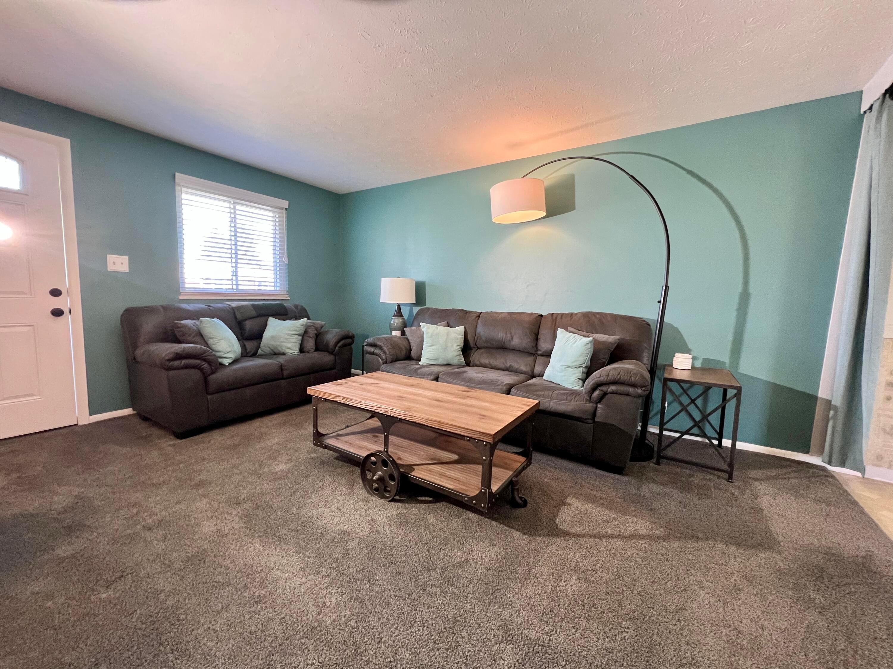 3746 Ferman Road Columbus, OH 43207 - Photo 5 of 22 Charming living room with fresh paint & carpet.