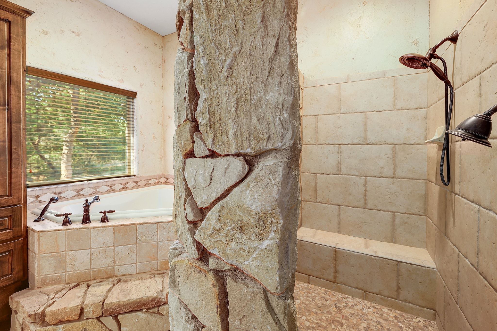 1120 Redbird Road Granger, TX 76530 - Photo 21 of 40 Full bathroom featuring tiled shower and a garden tub