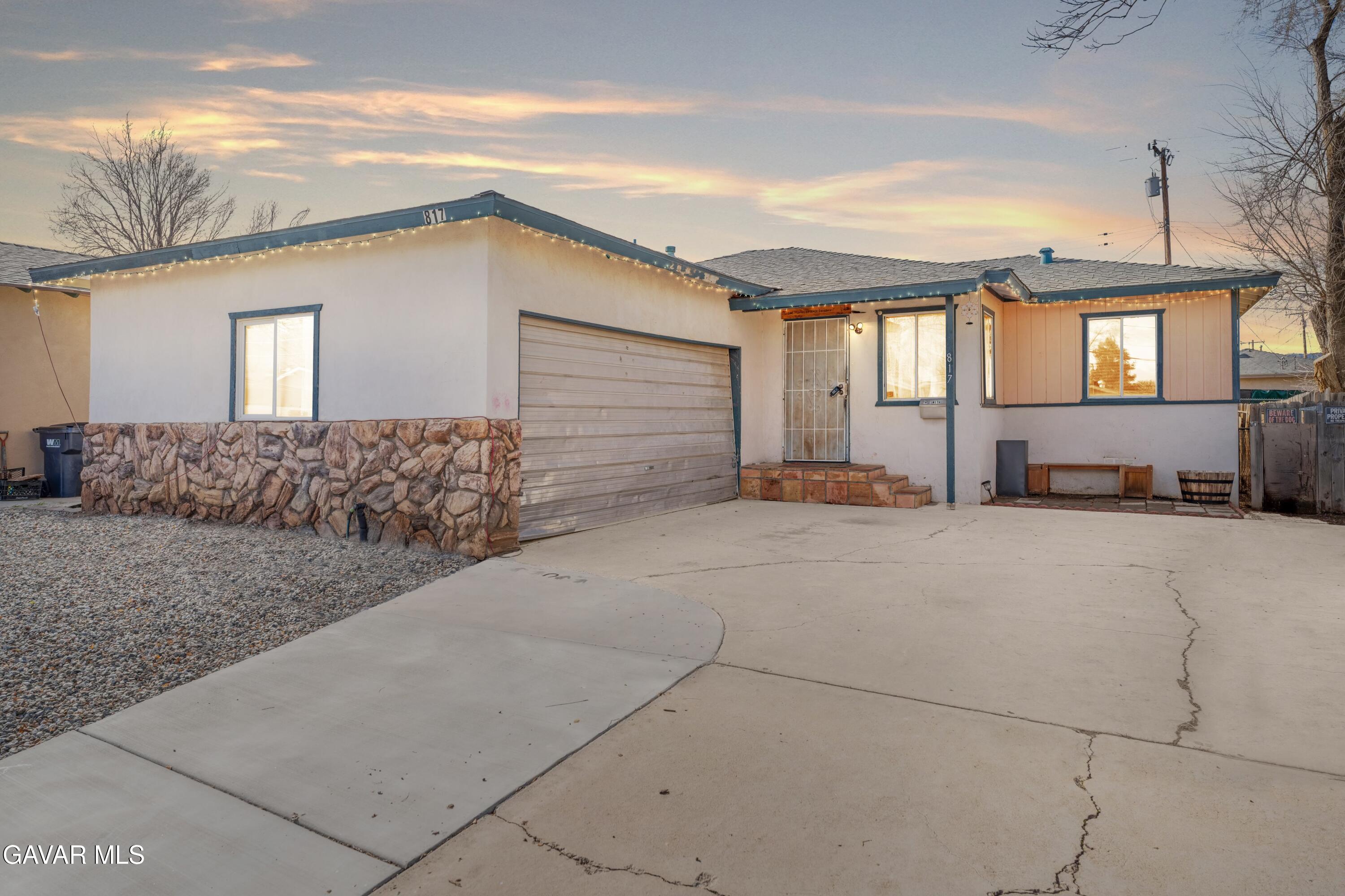 817 Oakwood Street Tehachapi, CA 93561 - Photo 12 of 12 a view of a house with a outdoor space