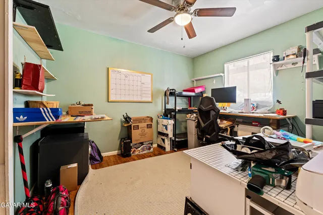 a view of a workspace with furniture