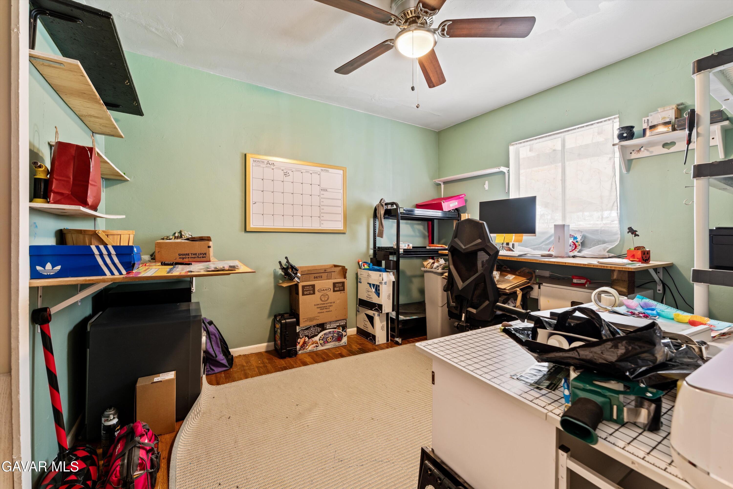 817 Oakwood Street Tehachapi, CA 93561 - Photo 8 of 12 a view of a workspace with furniture