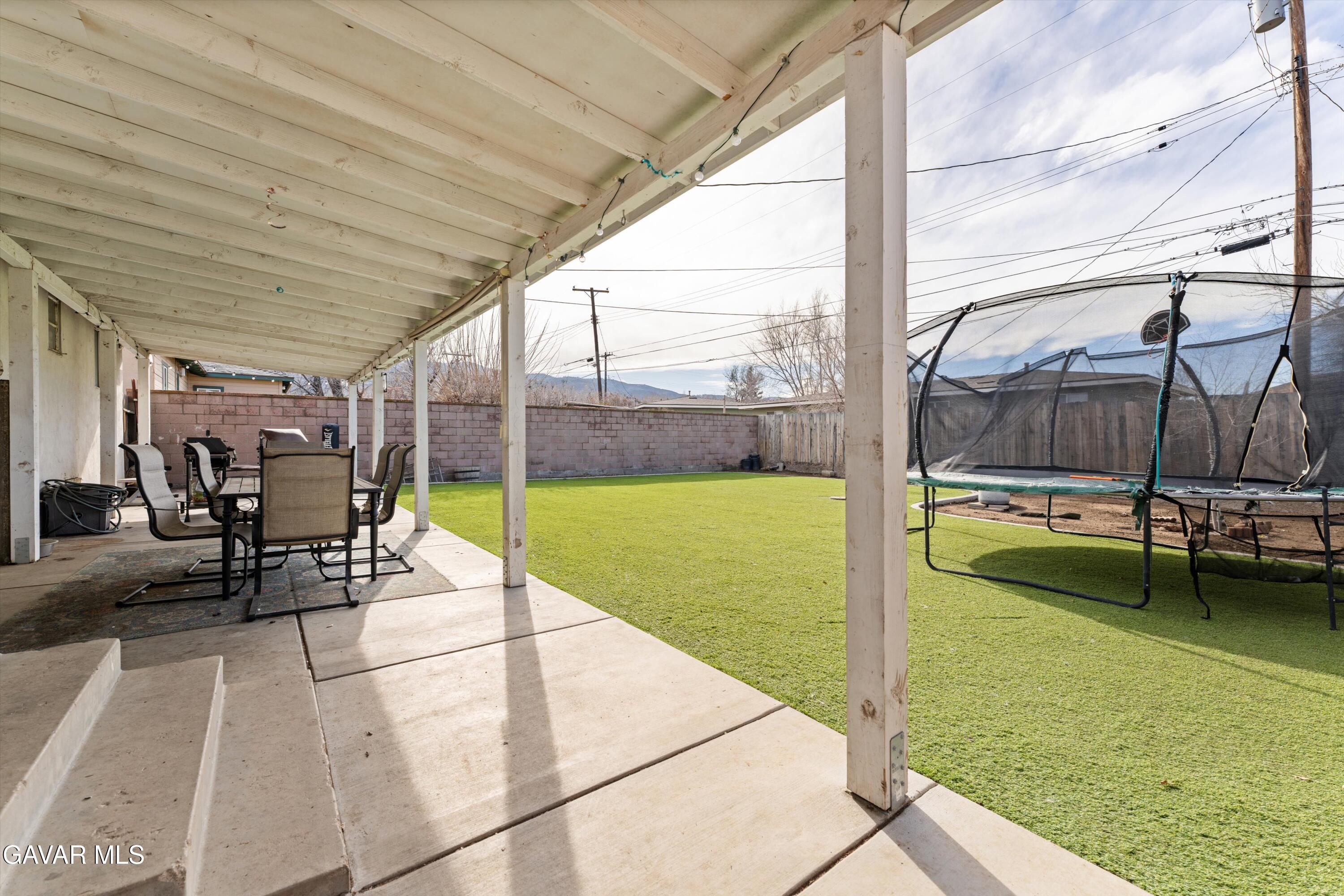 817 Oakwood Street Tehachapi, CA 93561 - Photo 10 of 12 a view of swimming pool with outdoor seating