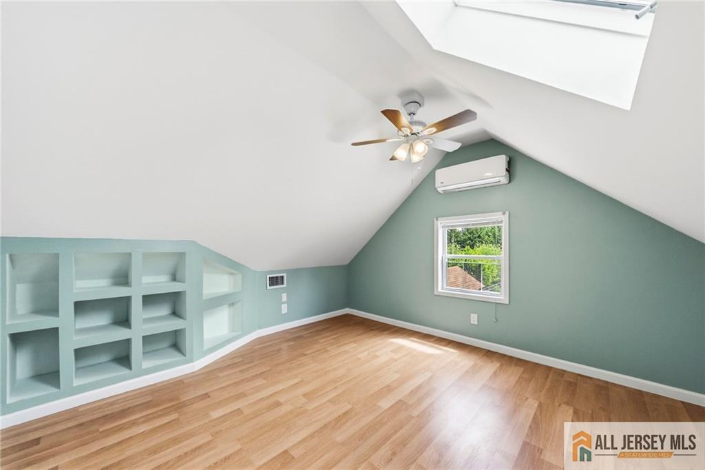 50 3rd Street Fords, NJ 08863 - Photo 24 of 36 an empty room with a workspace
