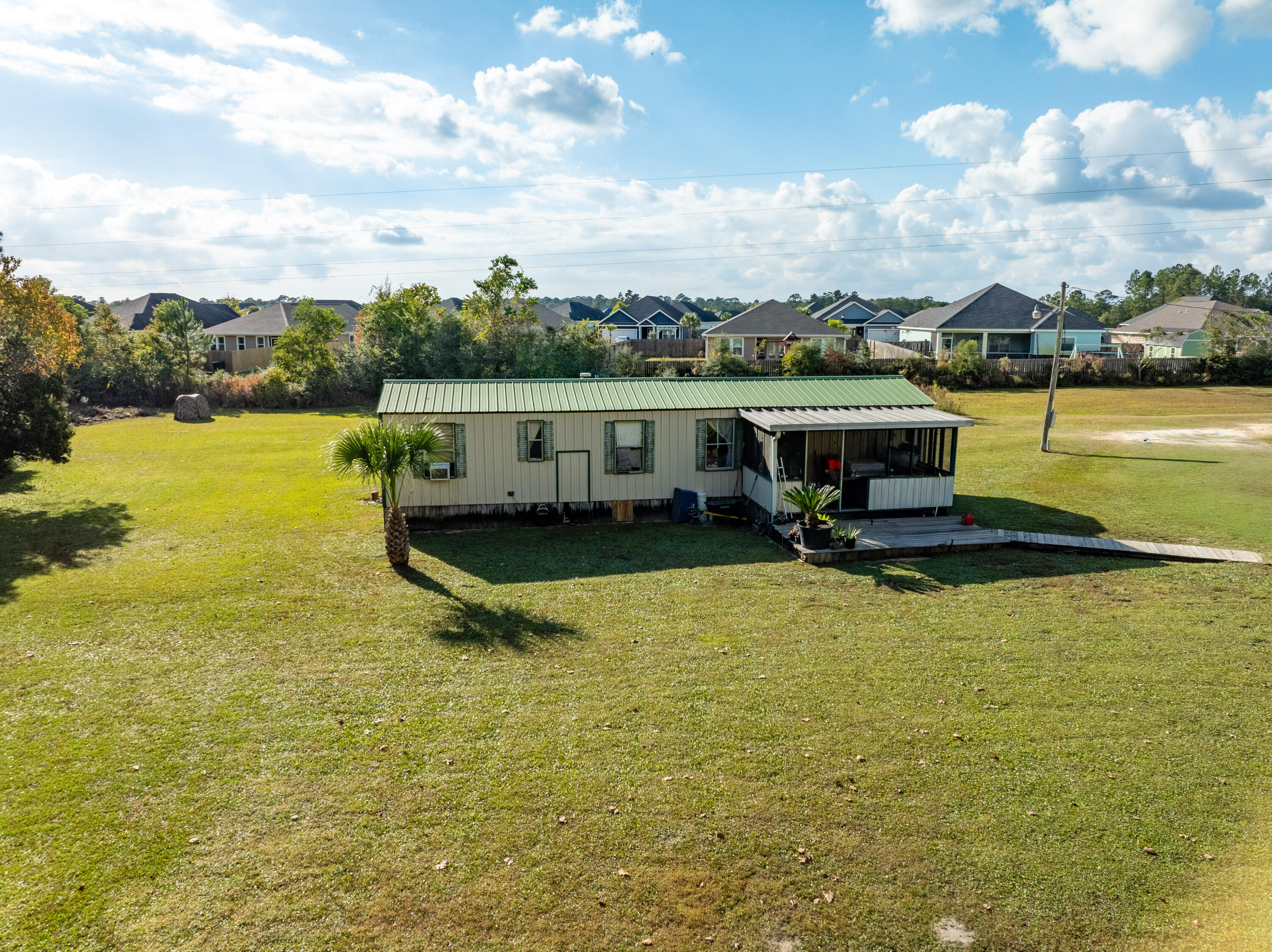 176 Bourbon Street Freeport, FL 32439 - Photo 14 of 15 a view of a swimming pool with an ocean view