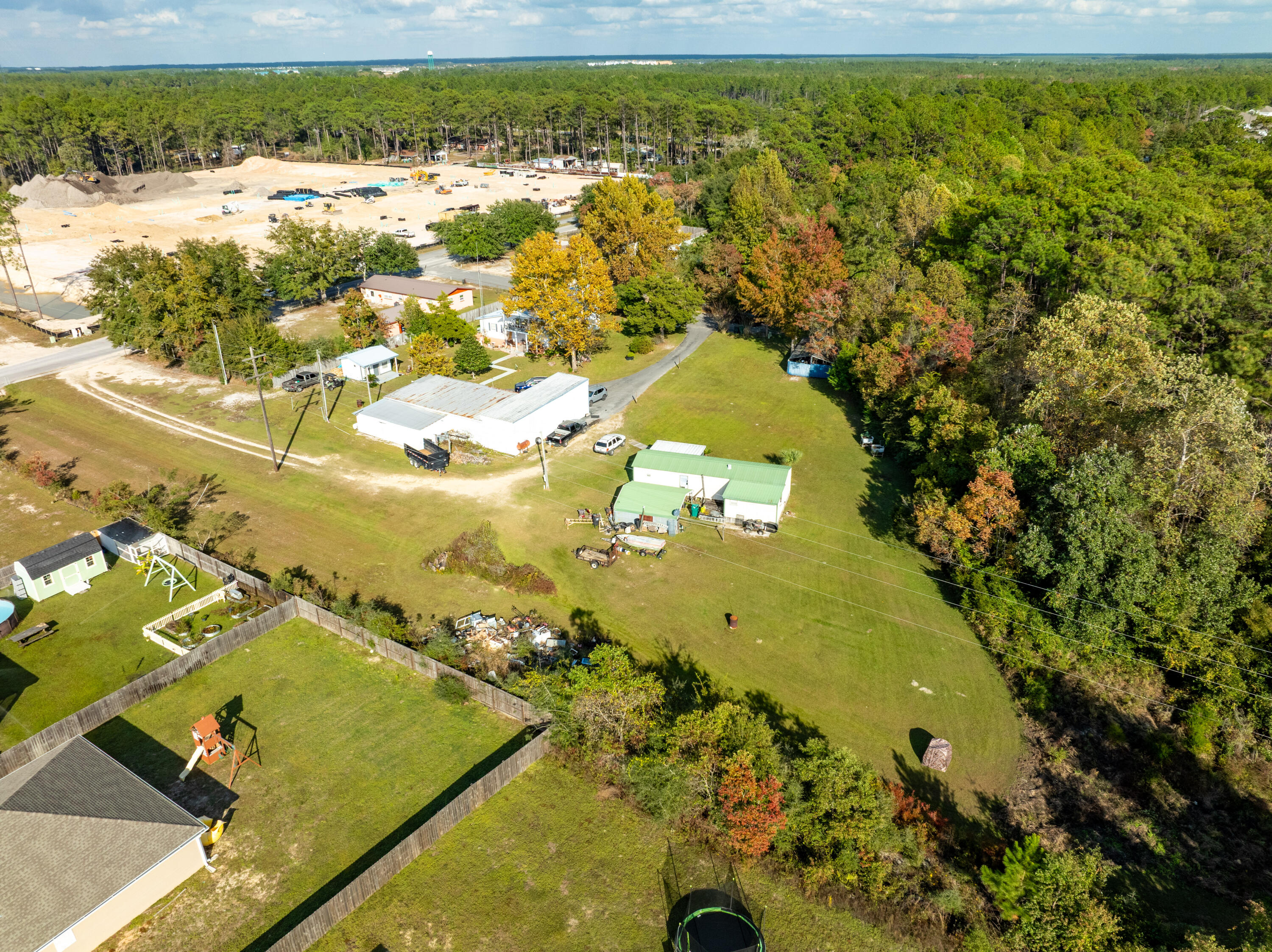 176 Bourbon Street Freeport, FL 32439 - Photo 3 of 15 a view of a yard with an outdoor space