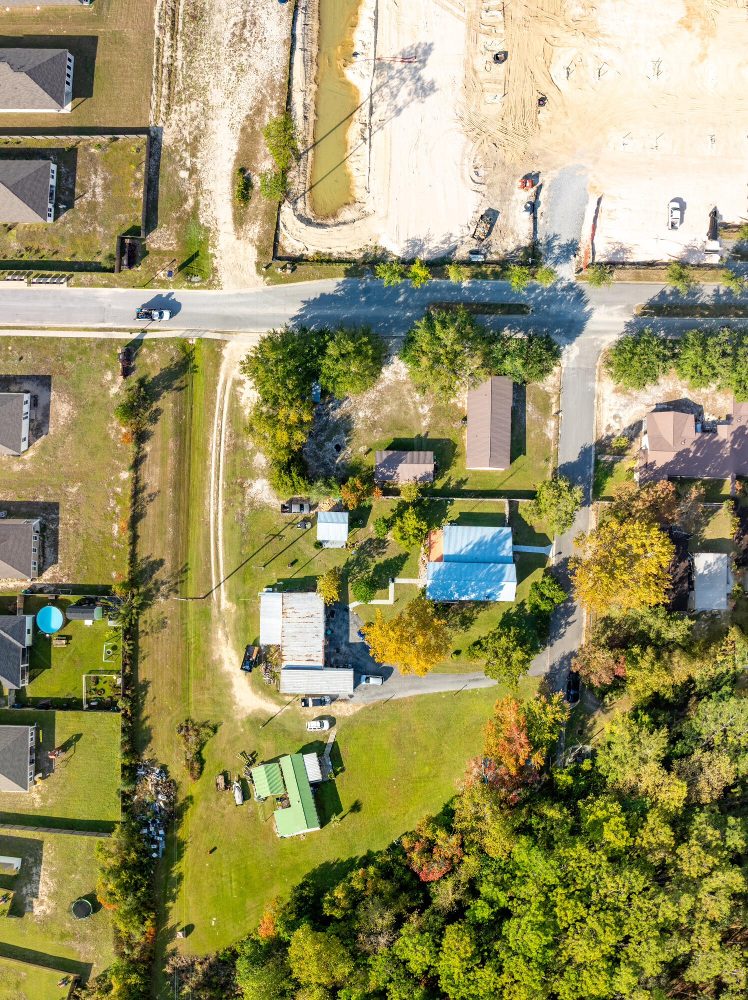 176 Bourbon Street Freeport, FL 32439 - Photo 4 of 15 an aerial view of residential houses with outdoor space