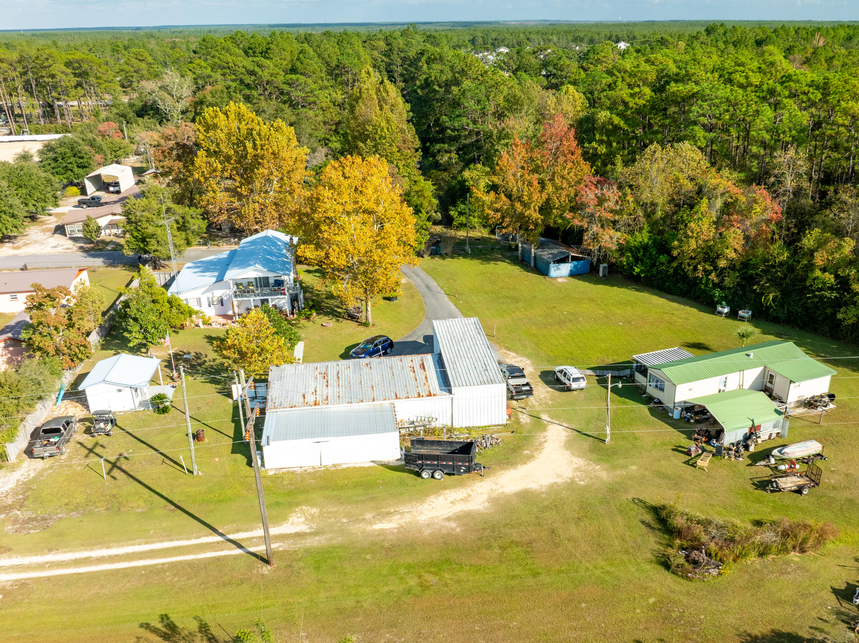 176 Bourbon Street Freeport, FL 32439 - Photo 6 of 15 an aerial view of residential houses with outdoor space