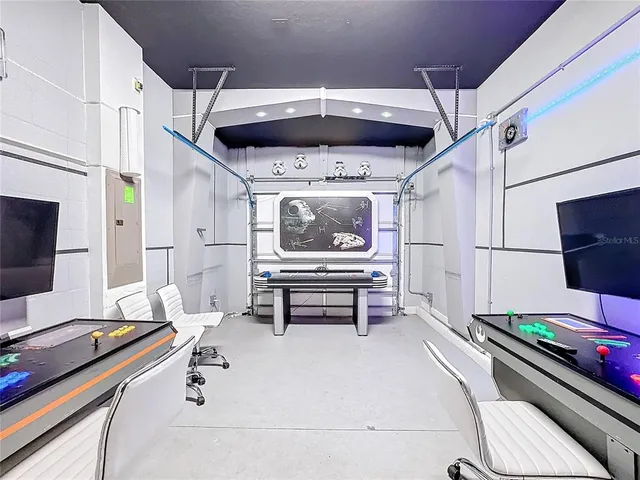 a bathroom with a granite countertop sink a toilet and a shower