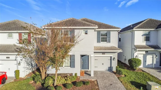 an aerial view of a city with lots of residential buildings