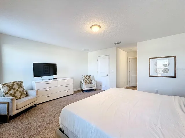 a living room with furniture gym and a window