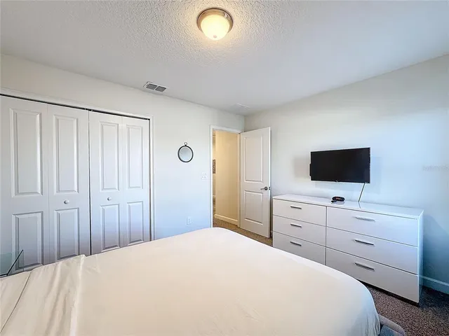 a view of a hallway with entryway