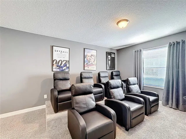 a view of a swimming pool with a garden