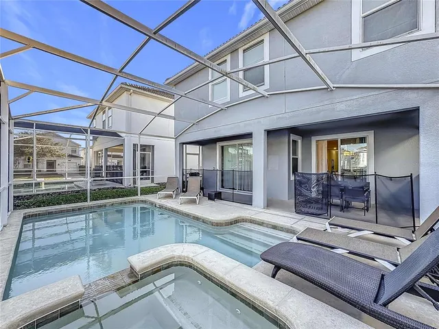 a bathroom with a shower and a sink