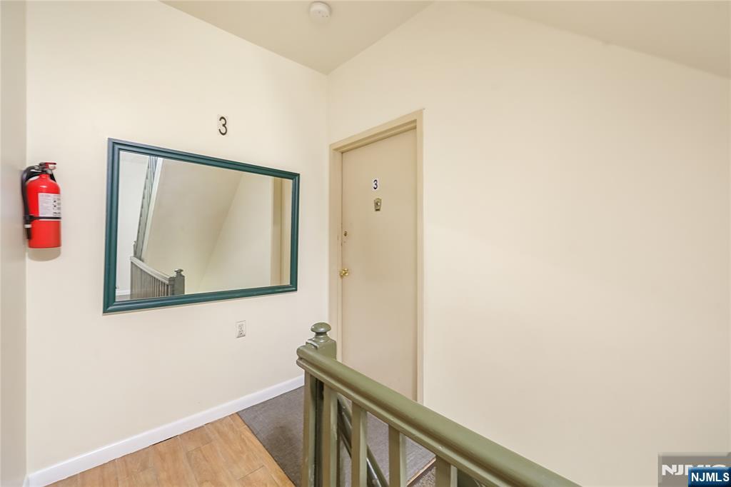 523 Adams Street, Unit 3 Hoboken, NJ 07030 - Photo 5 of 19 a view of a hallway with elevator