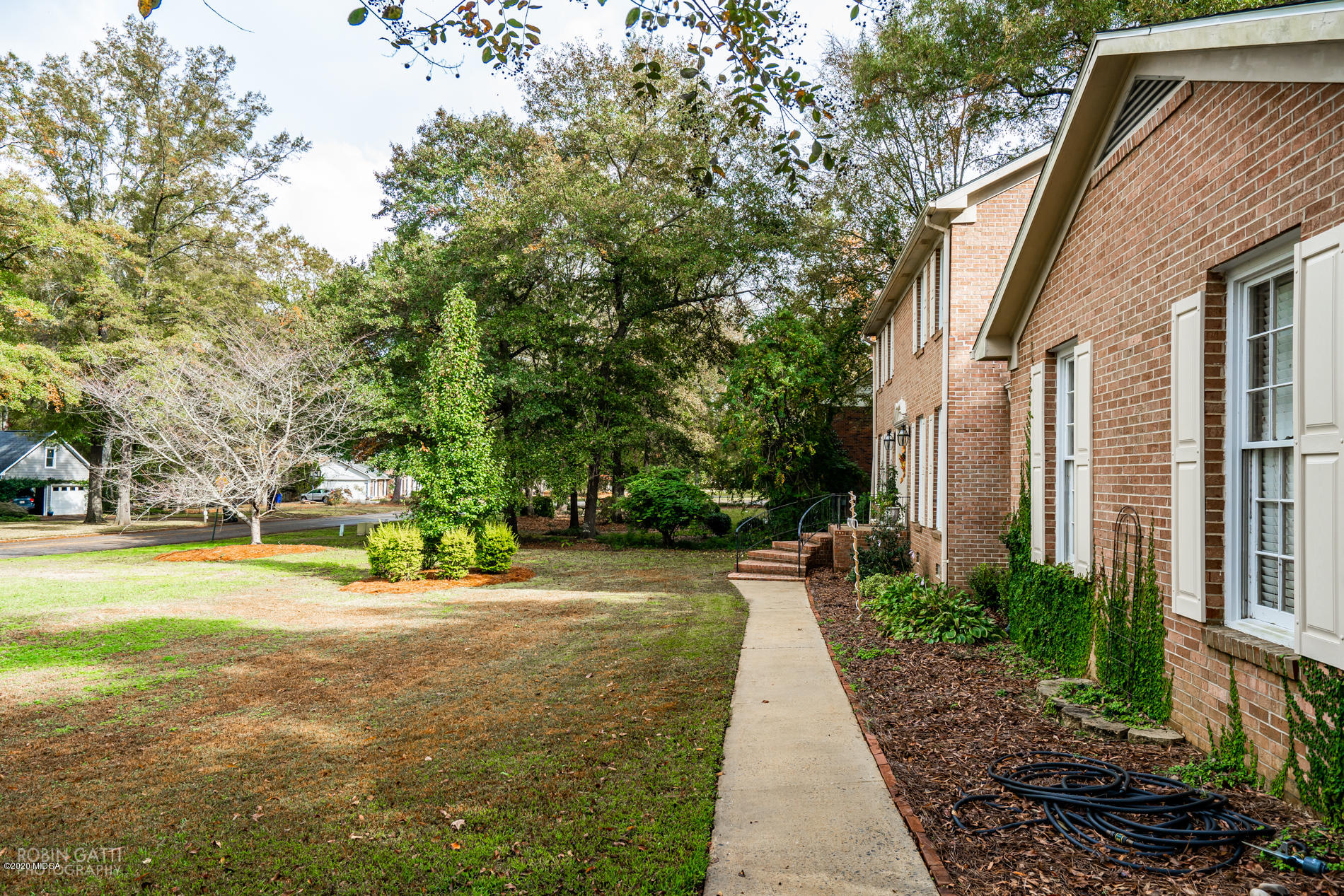 140 Castlegate Road Macon, GA 31210 - Photo 3 of 39 a view of a house with backyard and trees