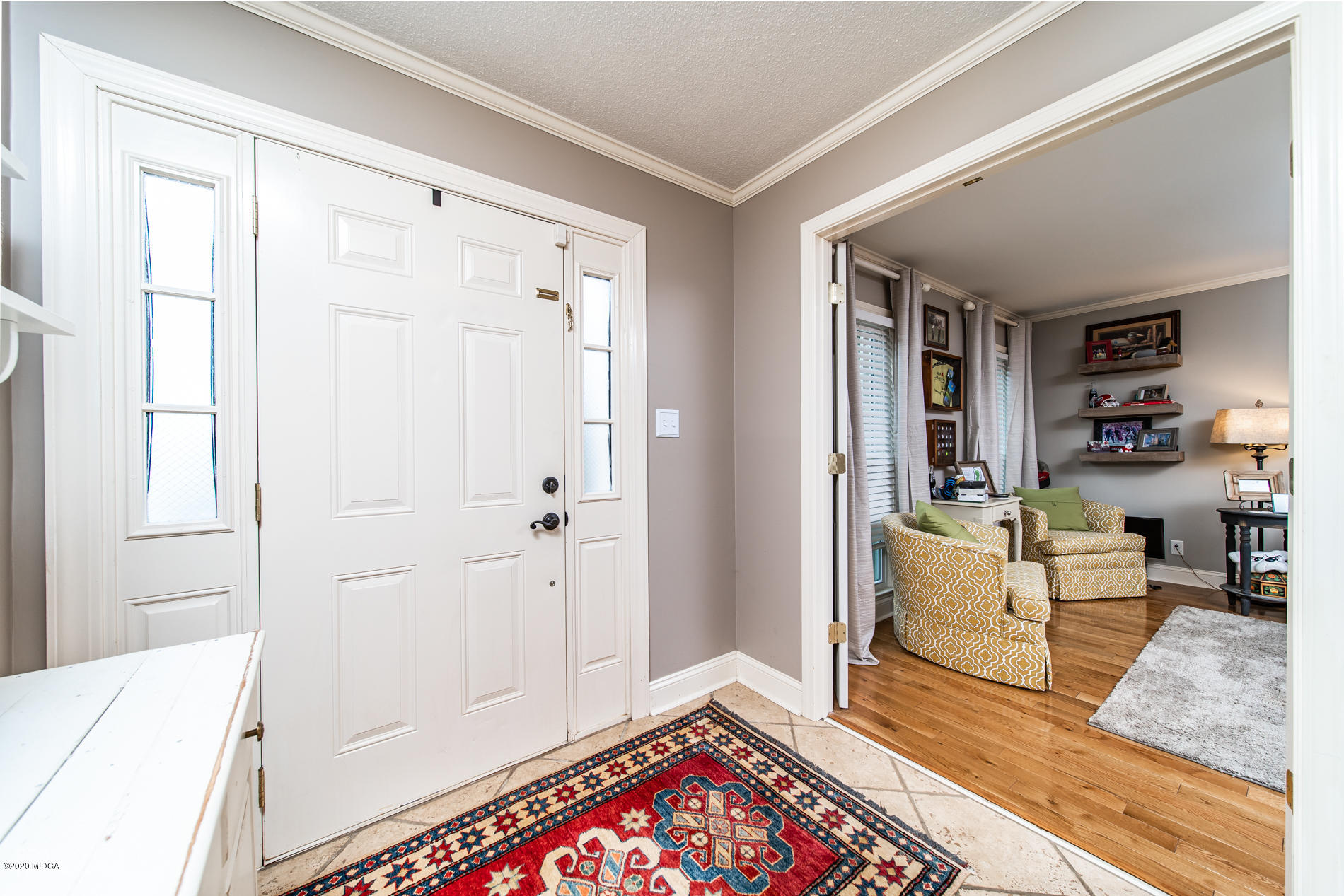140 Castlegate Road Macon, GA 31210 - Photo 23 of 39 a living room with furniture and a gate