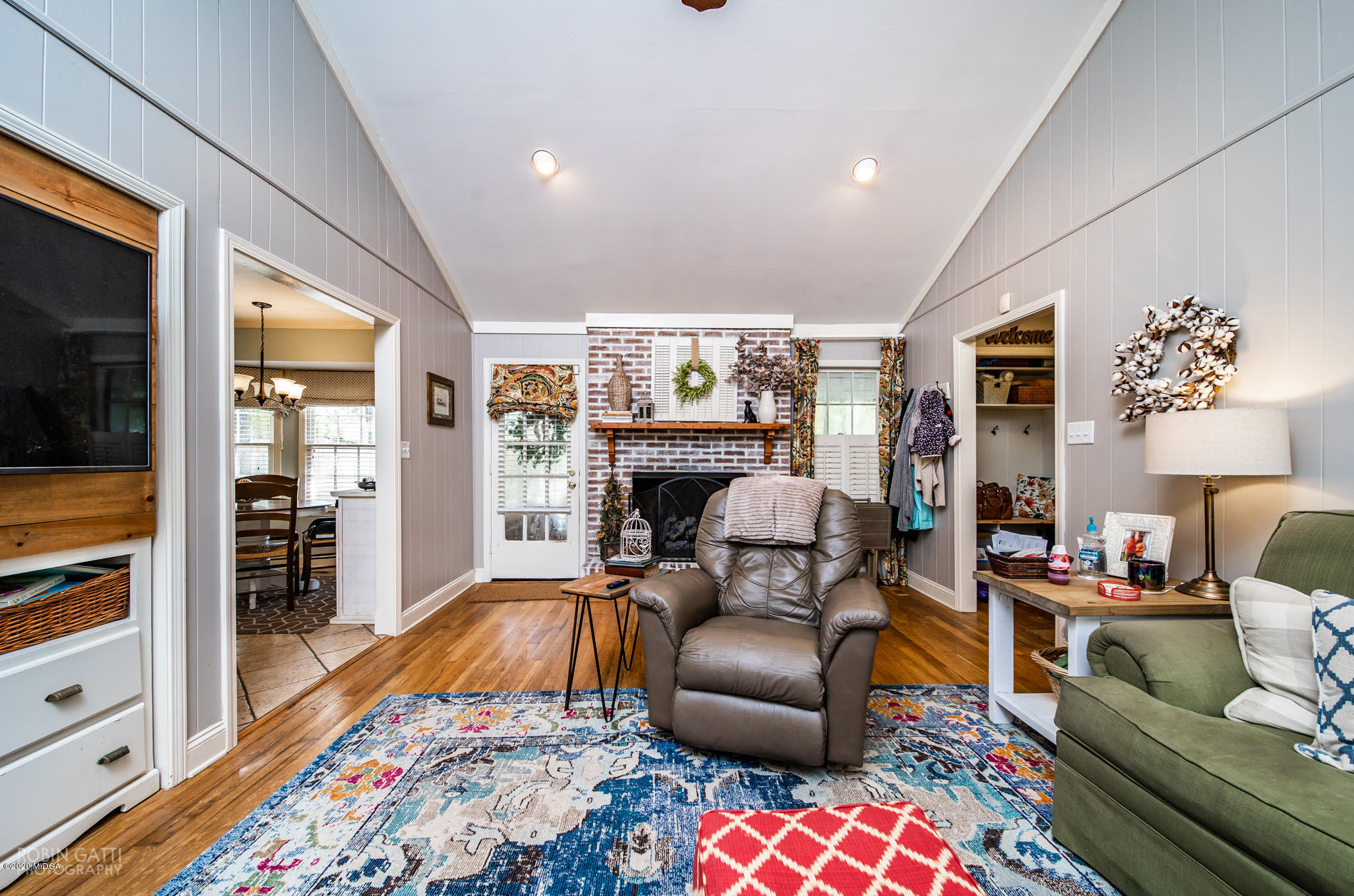 140 Castlegate Road Macon, GA 31210 - Photo 29 of 39 a living room with furniture fireplace and flat screen tv