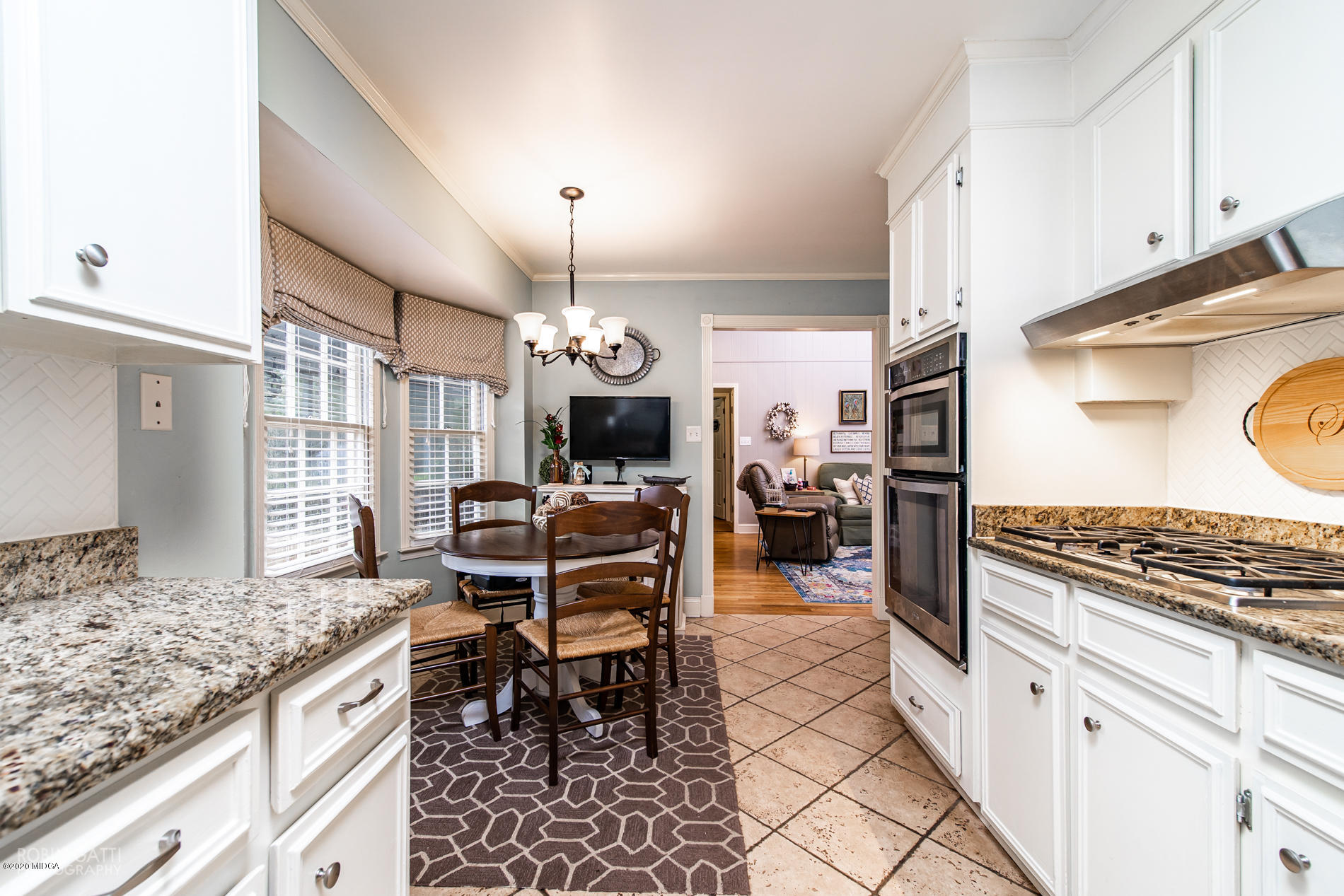 140 Castlegate Road Macon, GA 31210 - Photo 5 of 39 a kitchen with stainless steel appliances granite countertop a stove a sink and a refrigerator