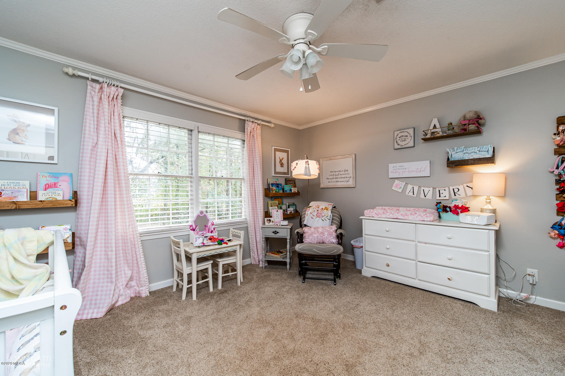 140 Castlegate Road Macon, GA 31210 - Photo 10 of 39 a living room with furniture and a large window