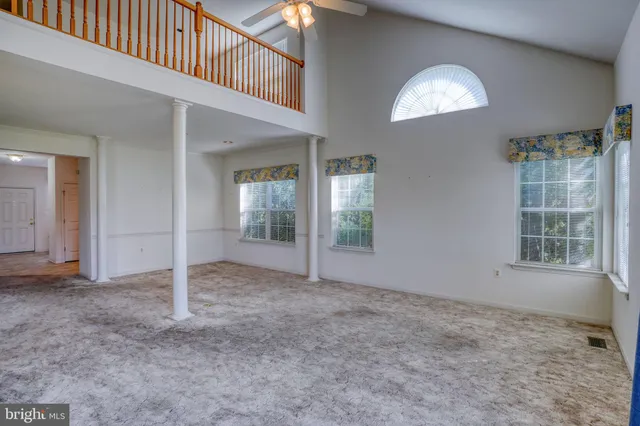 an empty room with windows