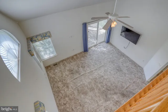 a view of livingroom with furniture and stairs