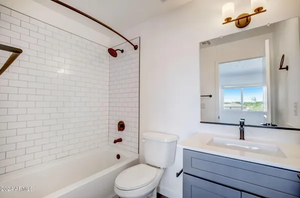 a view of a hallway with washer and dryer