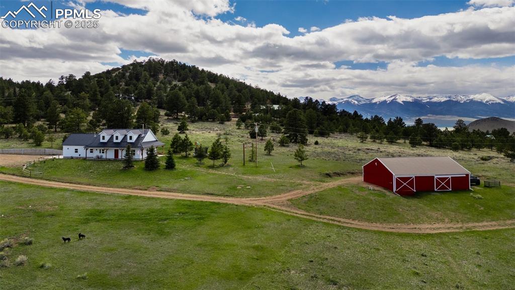 a view of a fountain in front of the house