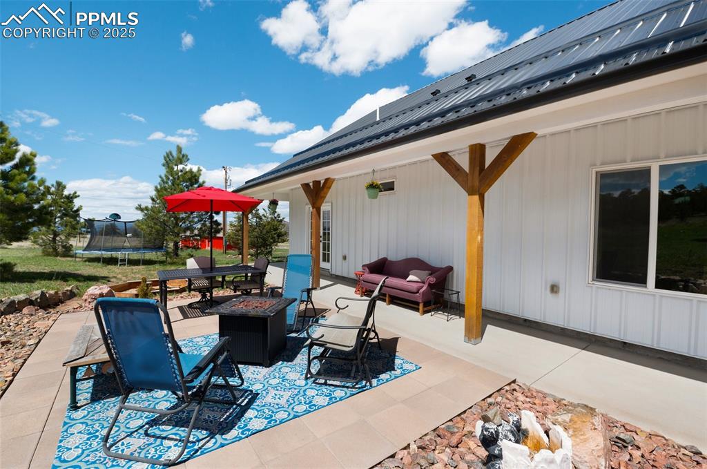 311 Knickerbocker Road Silver Cliff, CO 81252 - Photo 32 of 50 a outdoor space with furniture