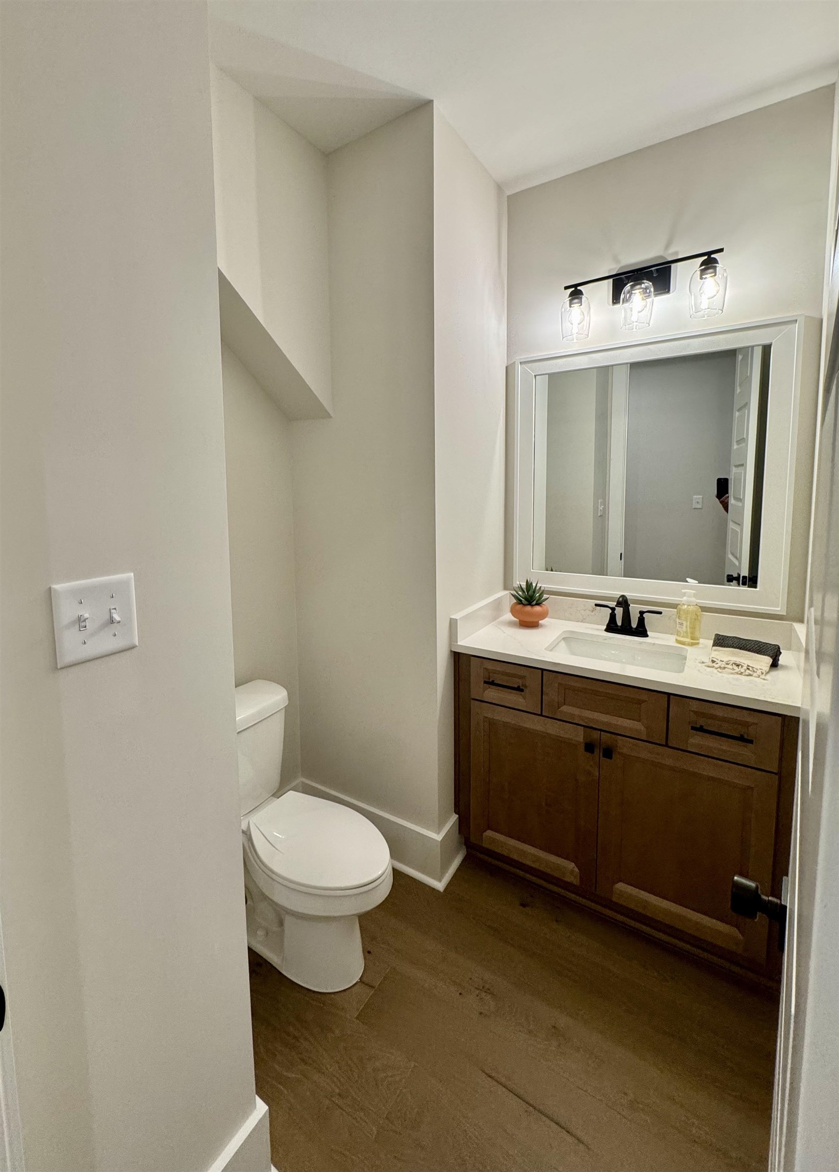 20 Rambling Rex Trail Piperton, TN 38017 - Photo 25 of 31 a bathroom with a double vanity sink mirror and toilet