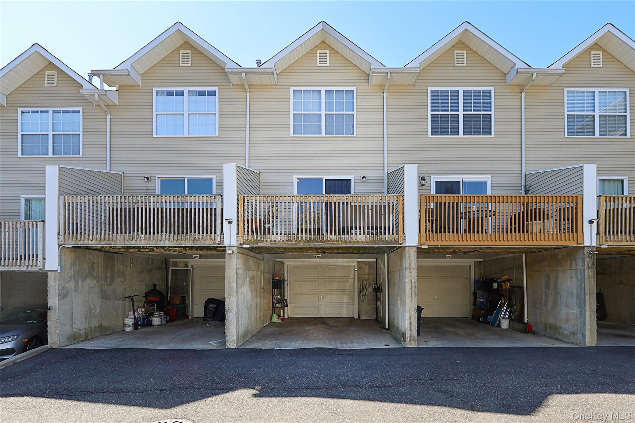 54 Landing Road Glen Cove, NY 11542 - Photo 23 of 24 a view of multiple houses with deck