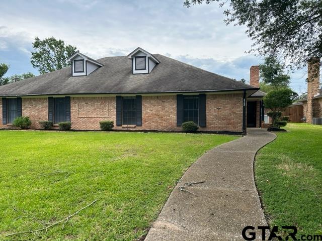 5702 Foxcroft Road Tyler, TX 75703 - Photo 1 of 10 a front view of house with yard