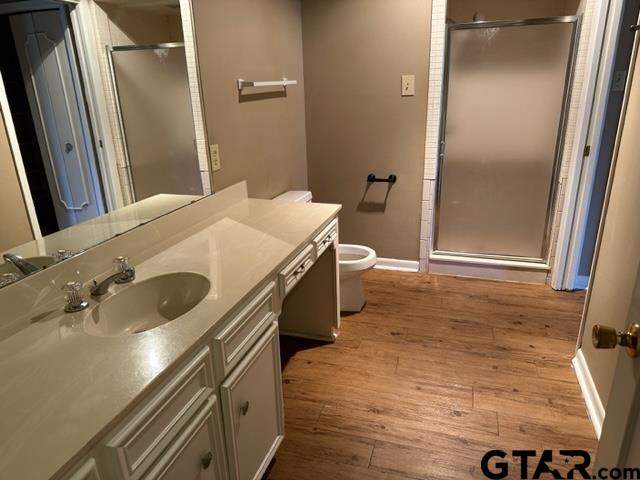 5702 Foxcroft Road Tyler, TX 75703 - Photo 7 of 10 a bathroom with a sink and mirror