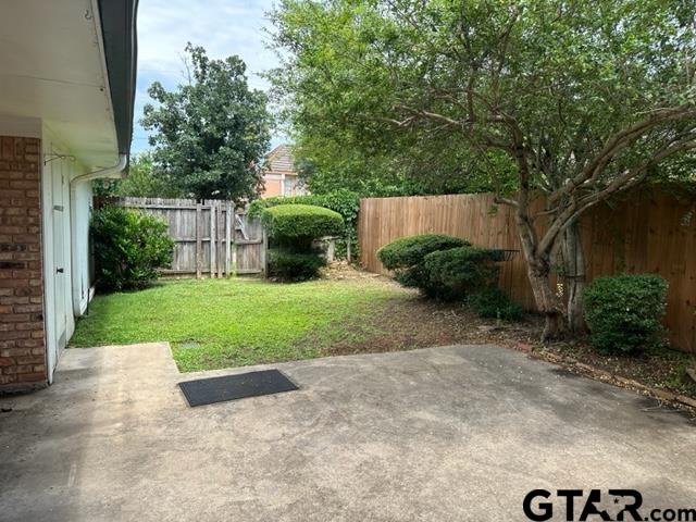5702 Foxcroft Road Tyler, TX 75703 - Photo 10 of 10 a view of backyard with plants and outdoor seating