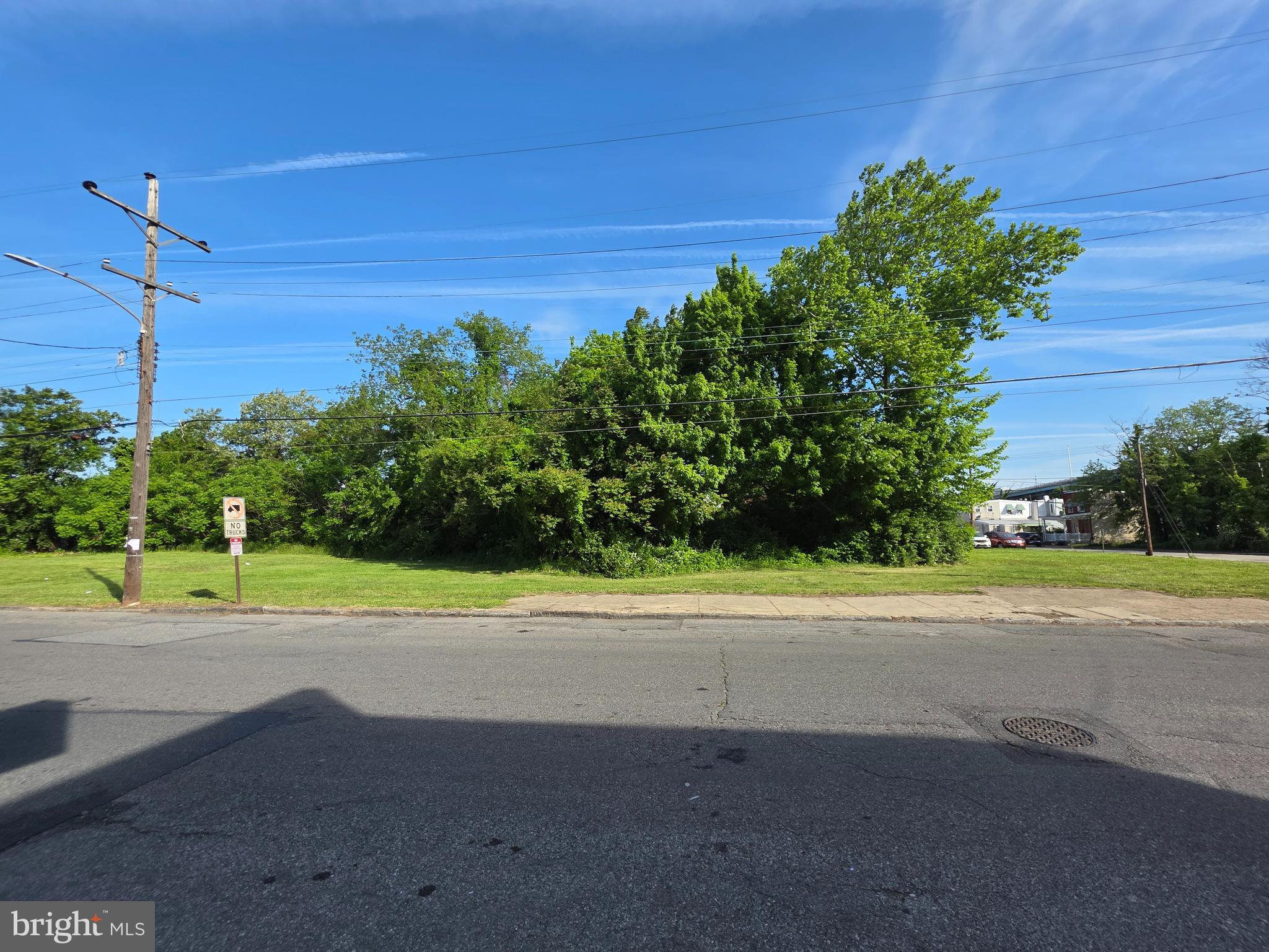 1902 West 3rd Street Chester, PA 19013 - Photo 2 of 5 a view of a road with a big yard