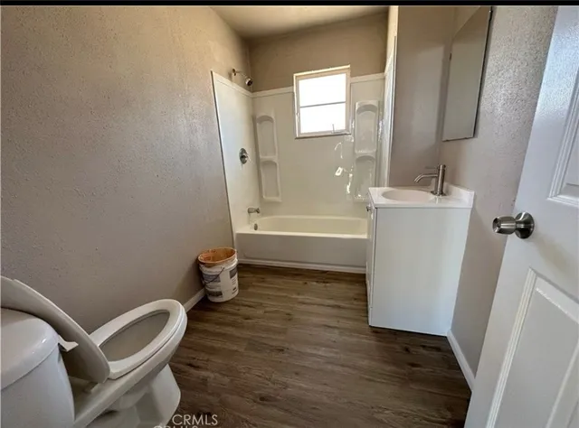 a bathroom with a sink and a bathtub